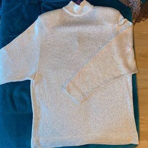Donna Karen silver turtle neck sweater.